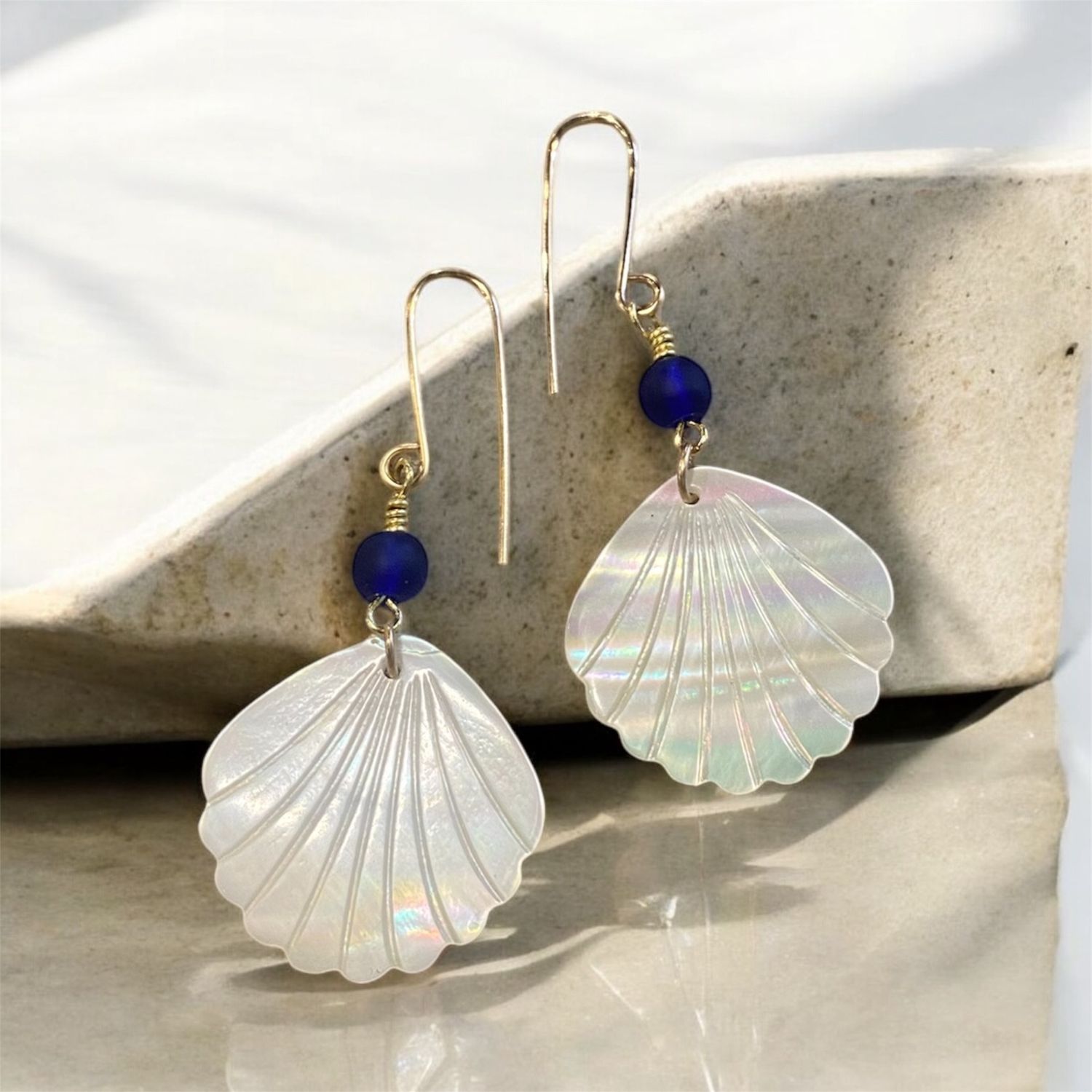 Sunshine Earring Mother of Pearl on Brass with Blue Bead