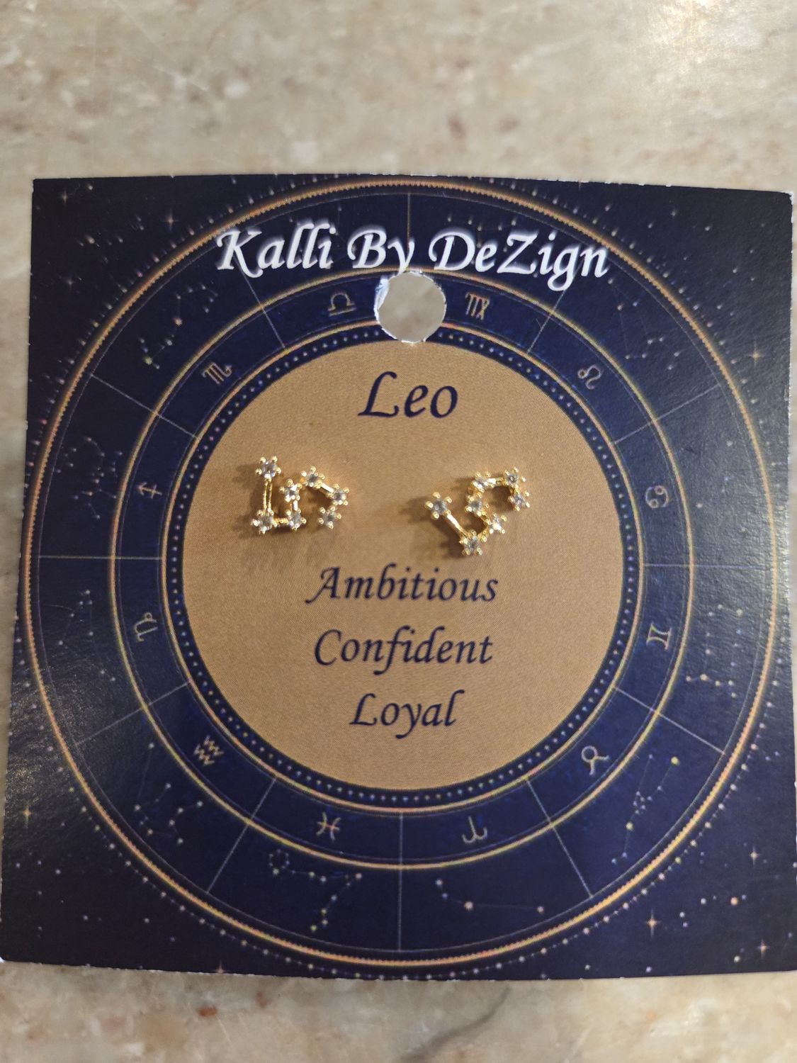 Kalli Earrings Gold Tone Leo