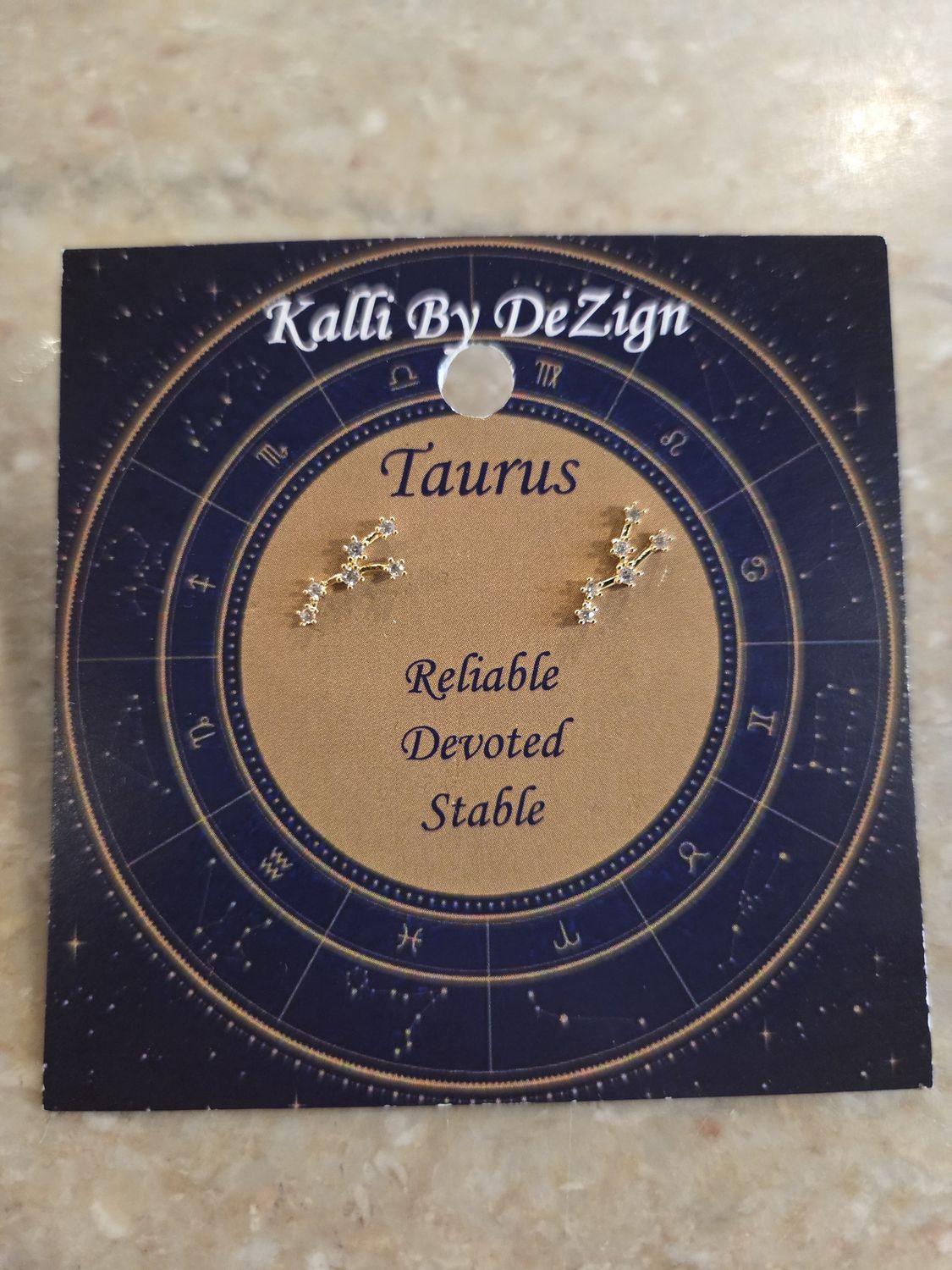 Kalli Earrings Gold Tone Taurus