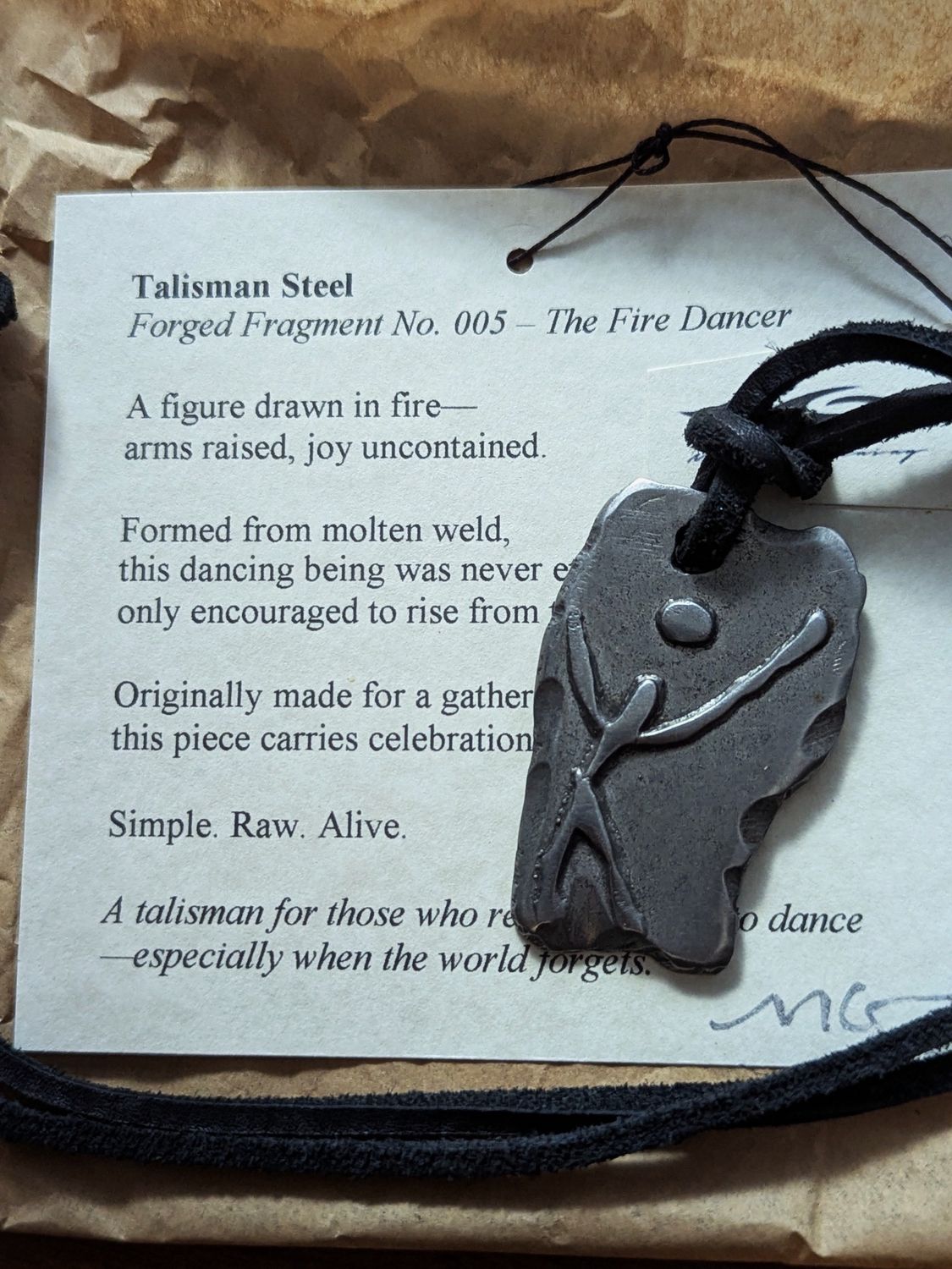 Groaning Talisman Steel Pendant on Leather- The Fire Dancer