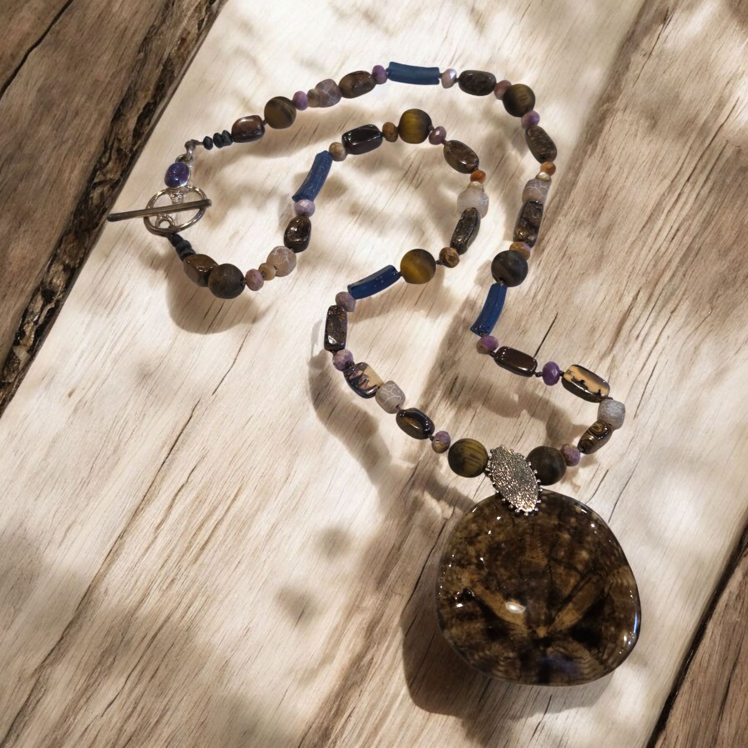 Logan Necklace Fossilized Sanddollar