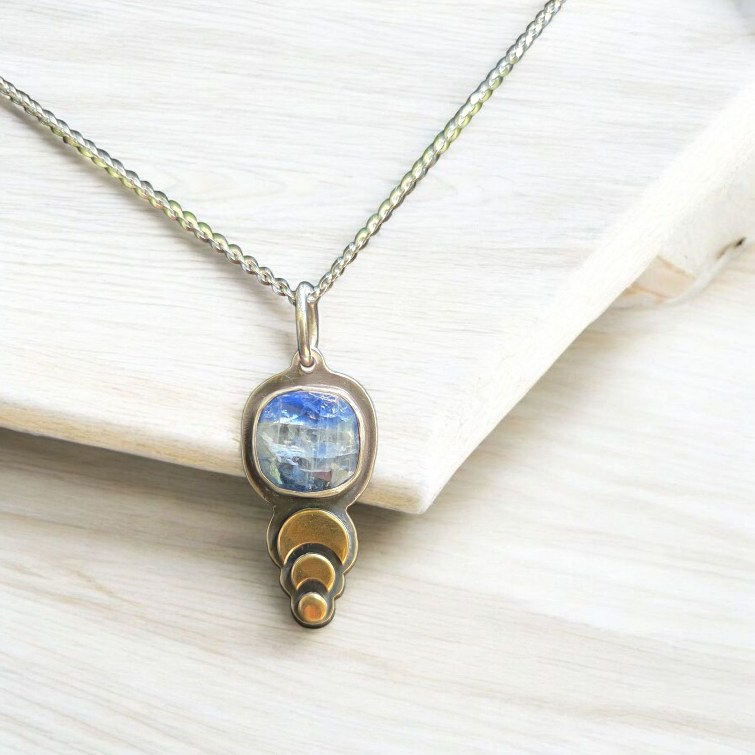 O&#39;Brien Necklace Sterling Silver with Blue Kyanite Cab and Brass Moon Phase Applique