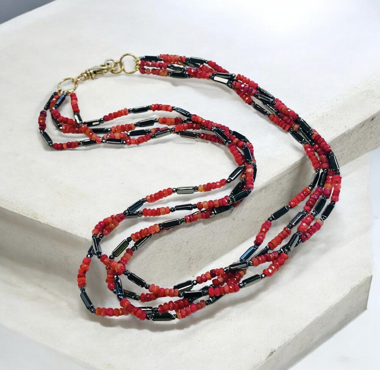Greenhood Necklace 4 Strand Ruby and Hematite Barrell