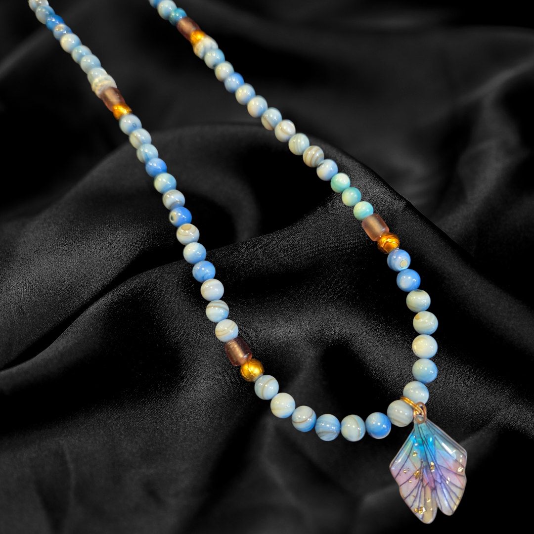 Duyssen Necklace Dyed Blue River Shell, Purple and Gold Glass Beads