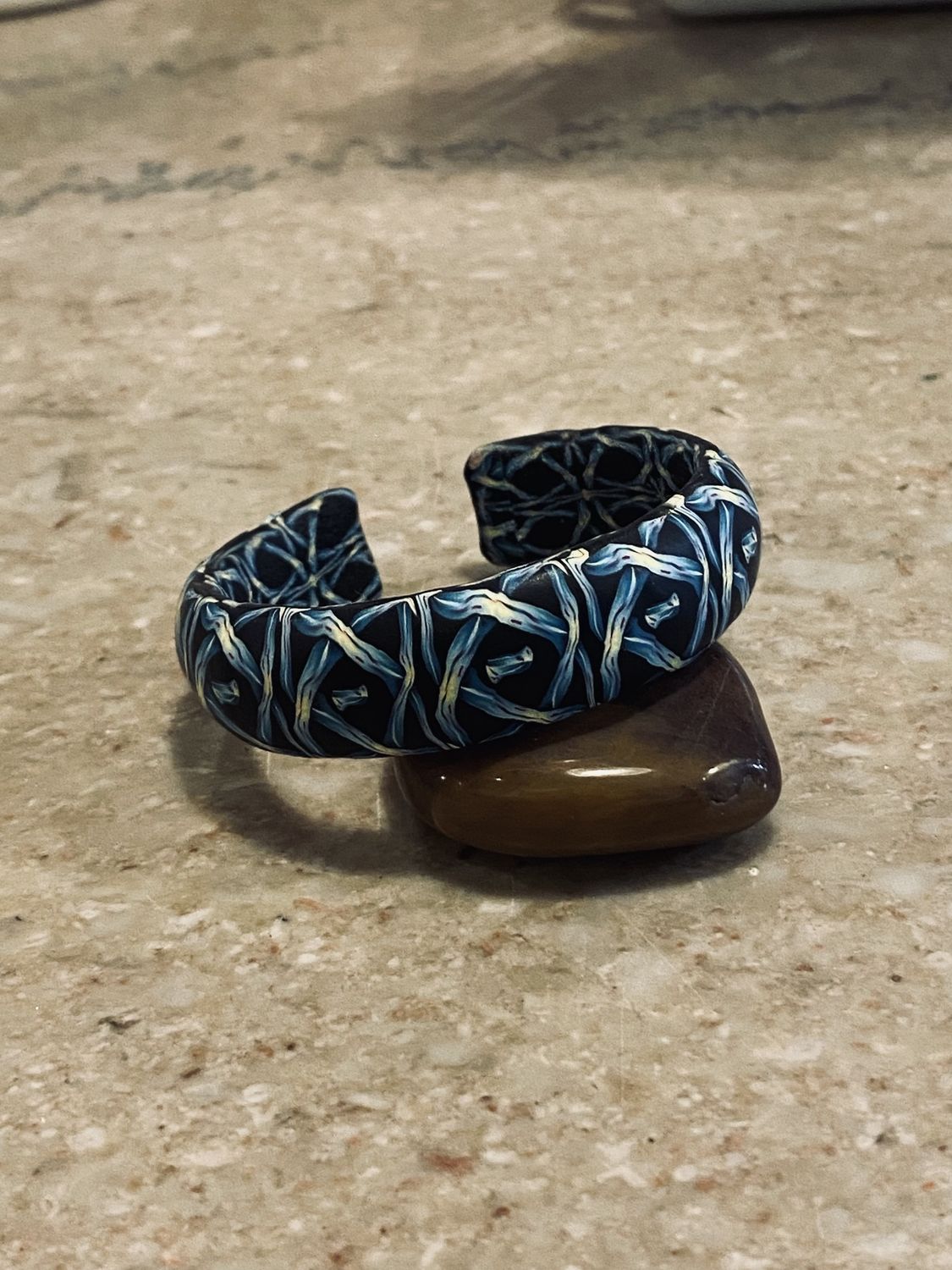 Most Bracelet Black w/ Blue/Yellow Criss Cross