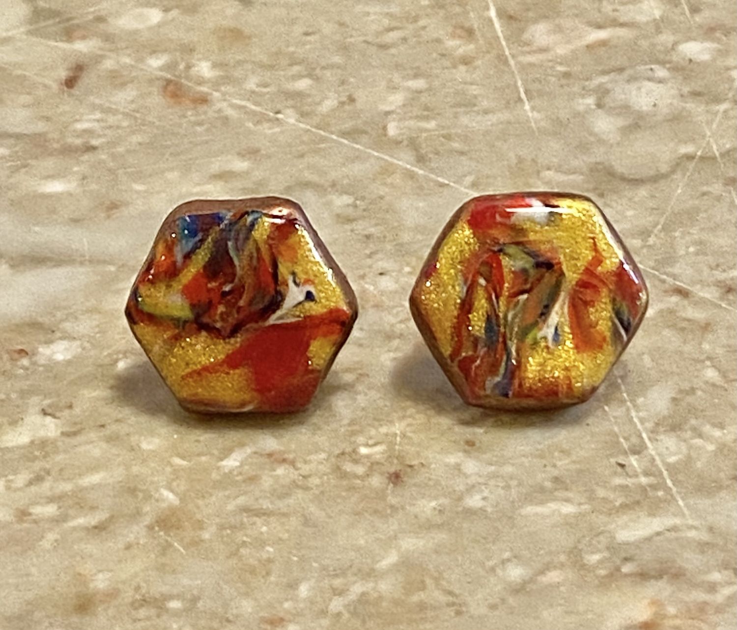 Most Earring Shimmering Yellow/Red Hexagon Studs