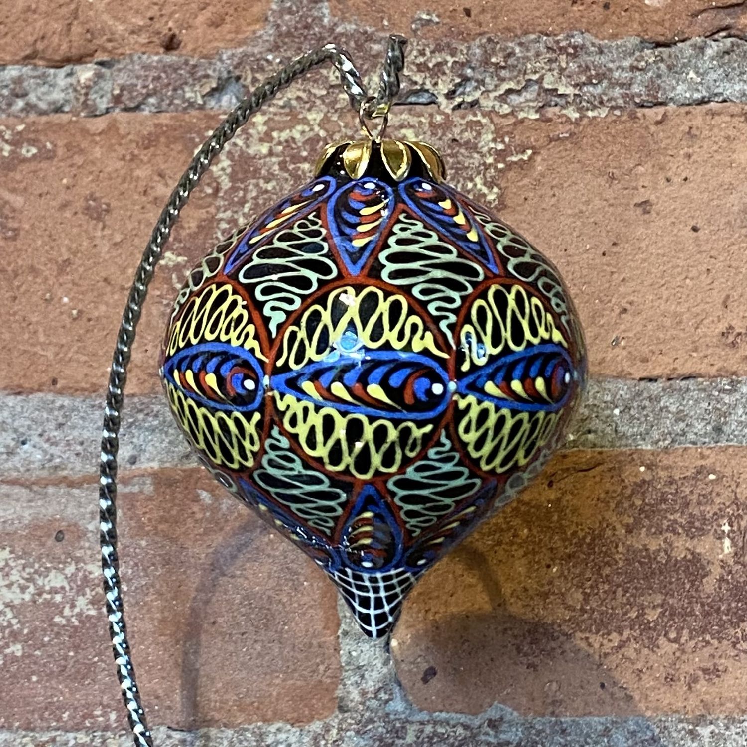 Heritage Ornament Brown w/ Red, Yellow, Green &amp; Blue Swiggles Tear Drop Ceramic