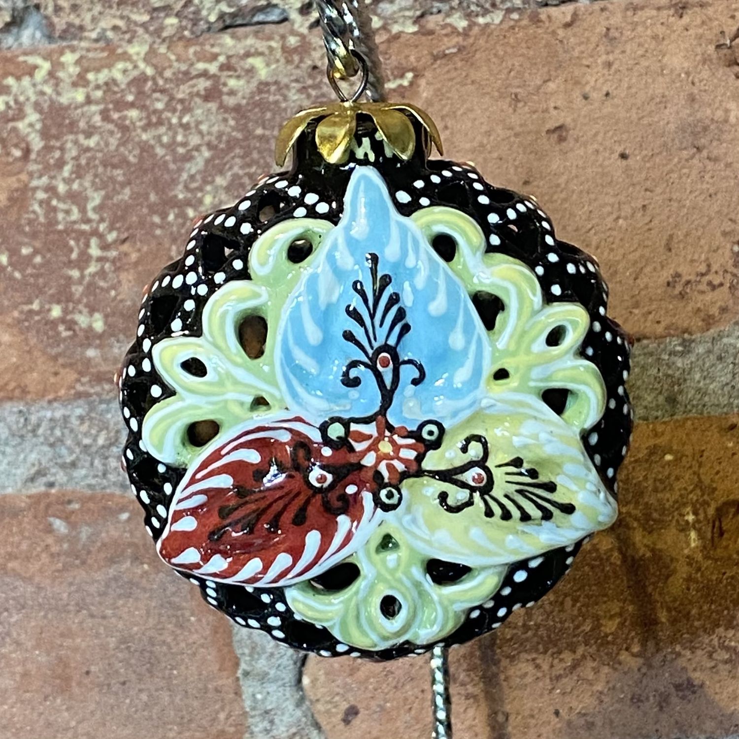 Heritage Ornament Brown Cutout Red, Blue &amp; Yellow Flower Flat Round Ceramic
