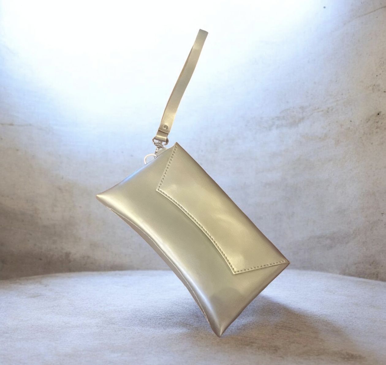 Penrod Leather Curved Clutch Golden