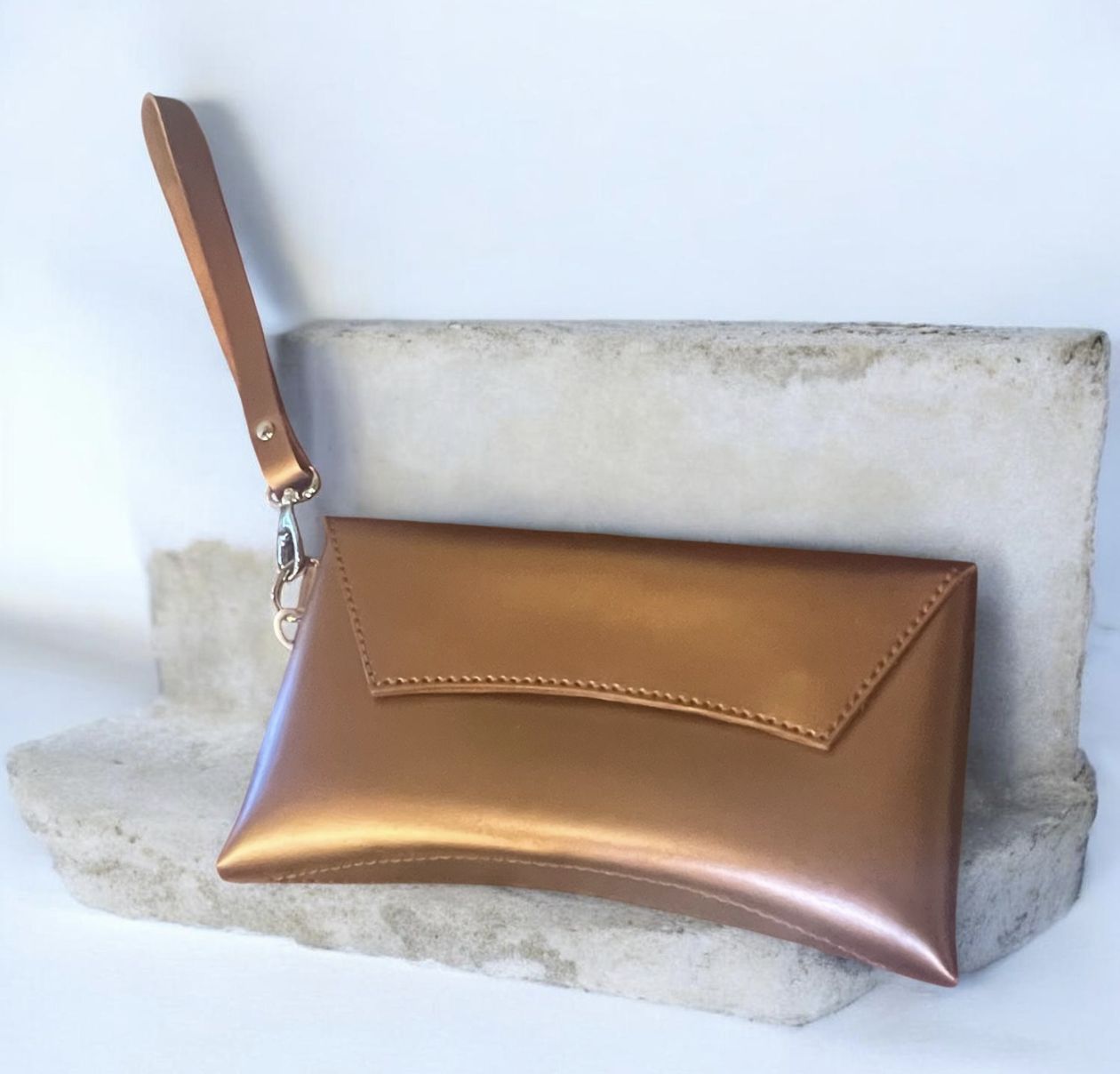Penrod Leather Curved Clutch Copper