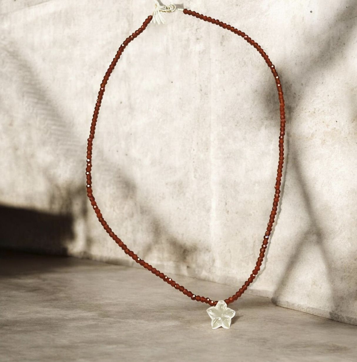 Trueworthy Tiny Faceted Carnelian with White Moonstone Flower
