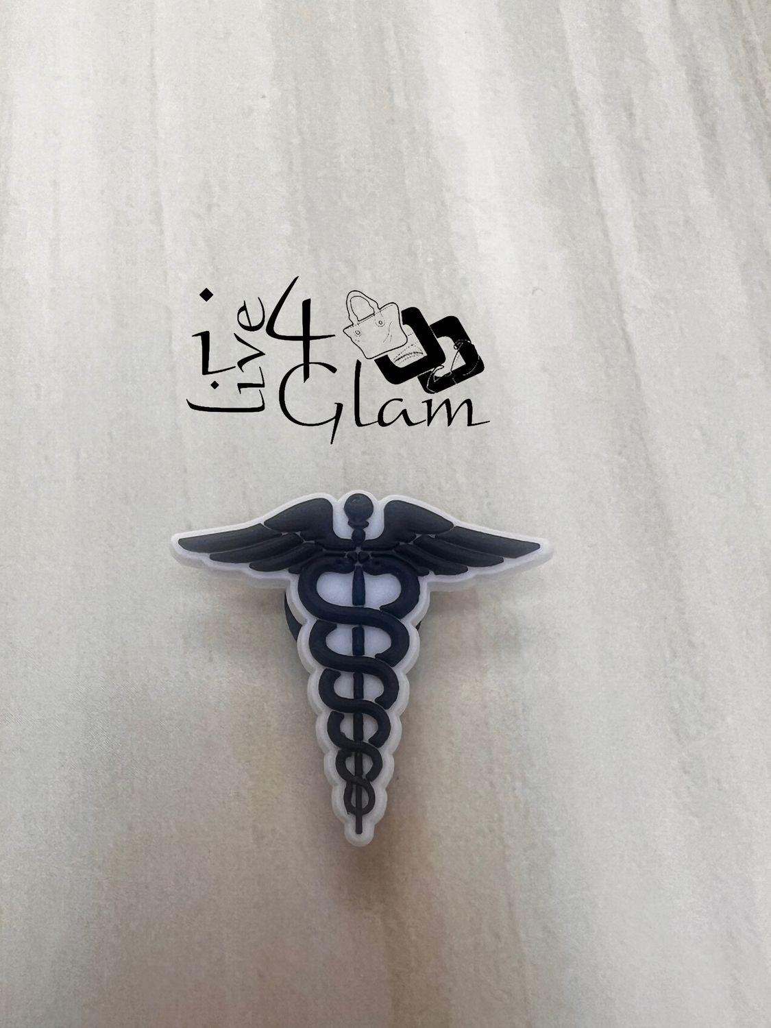 Medical Jibbit, Style: Caduceus