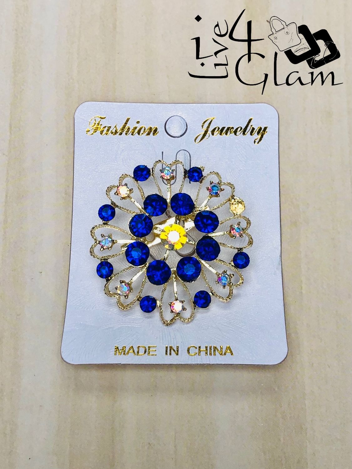 Gold Tone Round Blue Rhinestone Broach