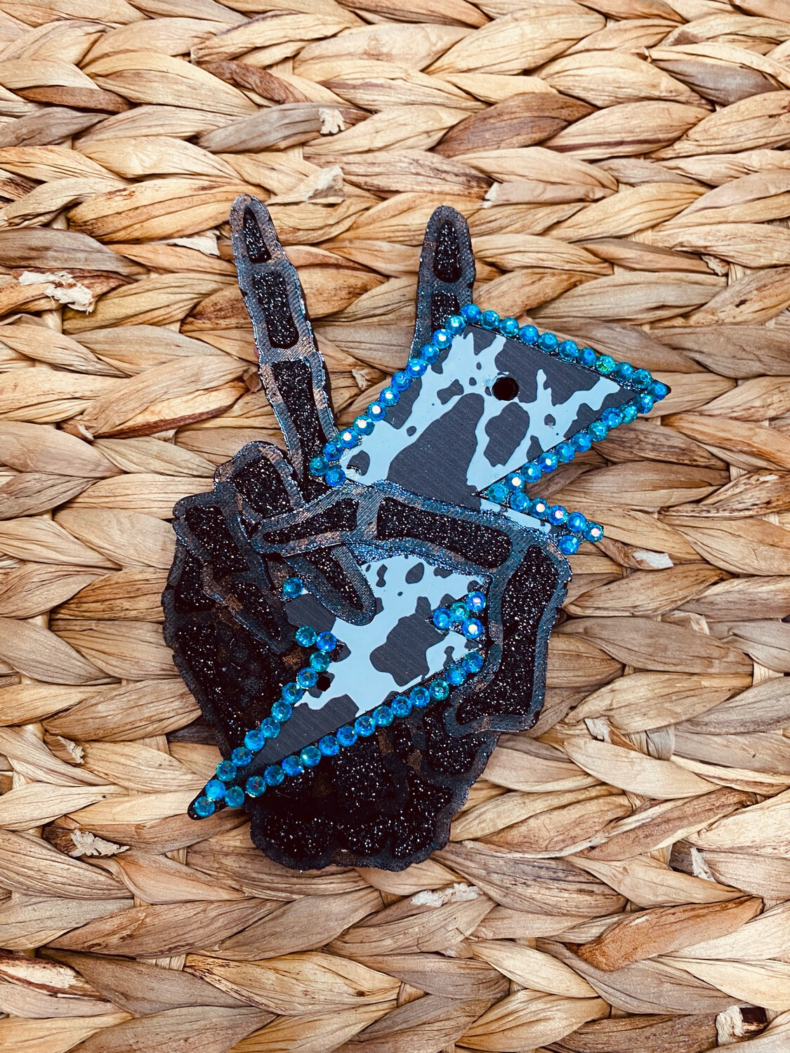 Skeleton hand cow print bolt