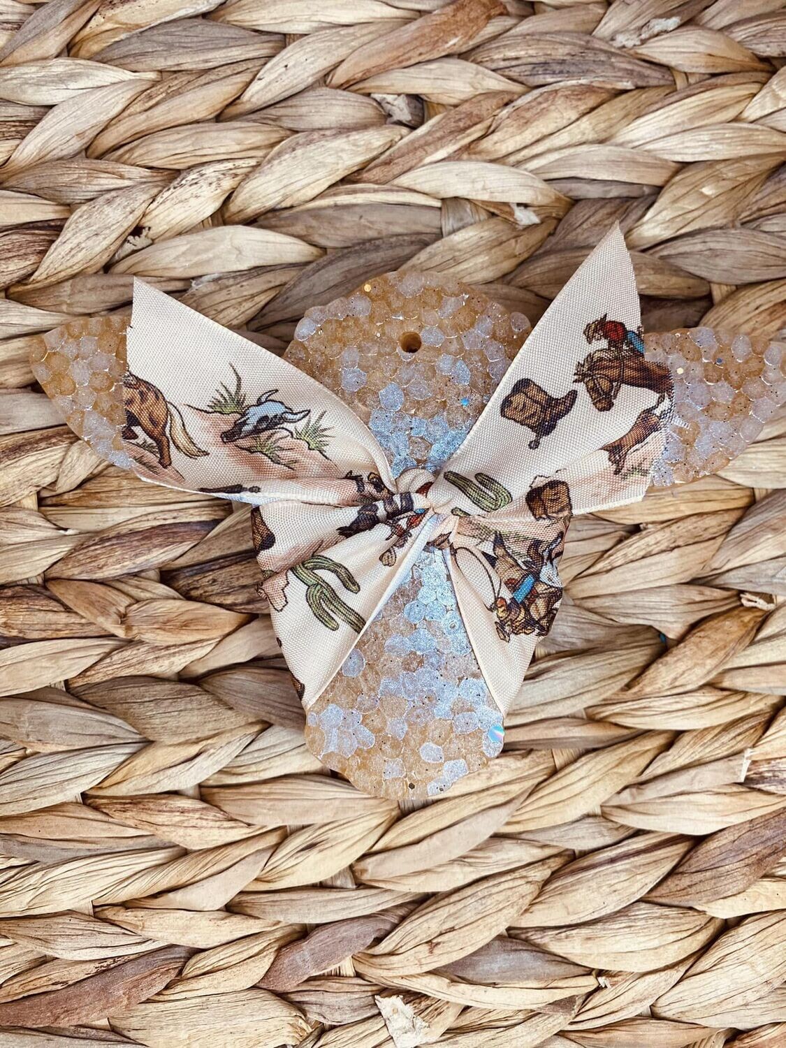 Cow with cowboy bow
