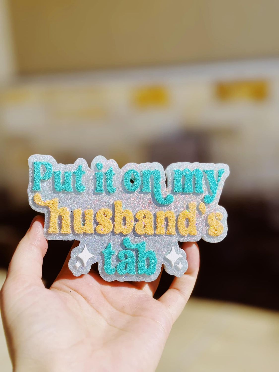 Put it on my husbands tab