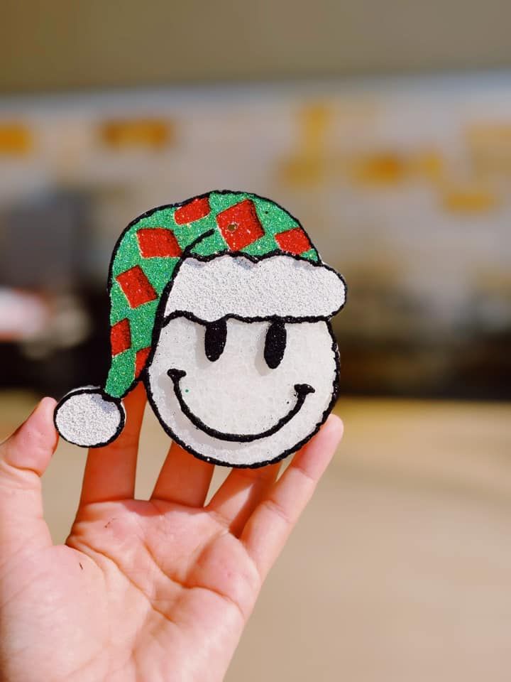 Smiley Face with checkered Santa Hat