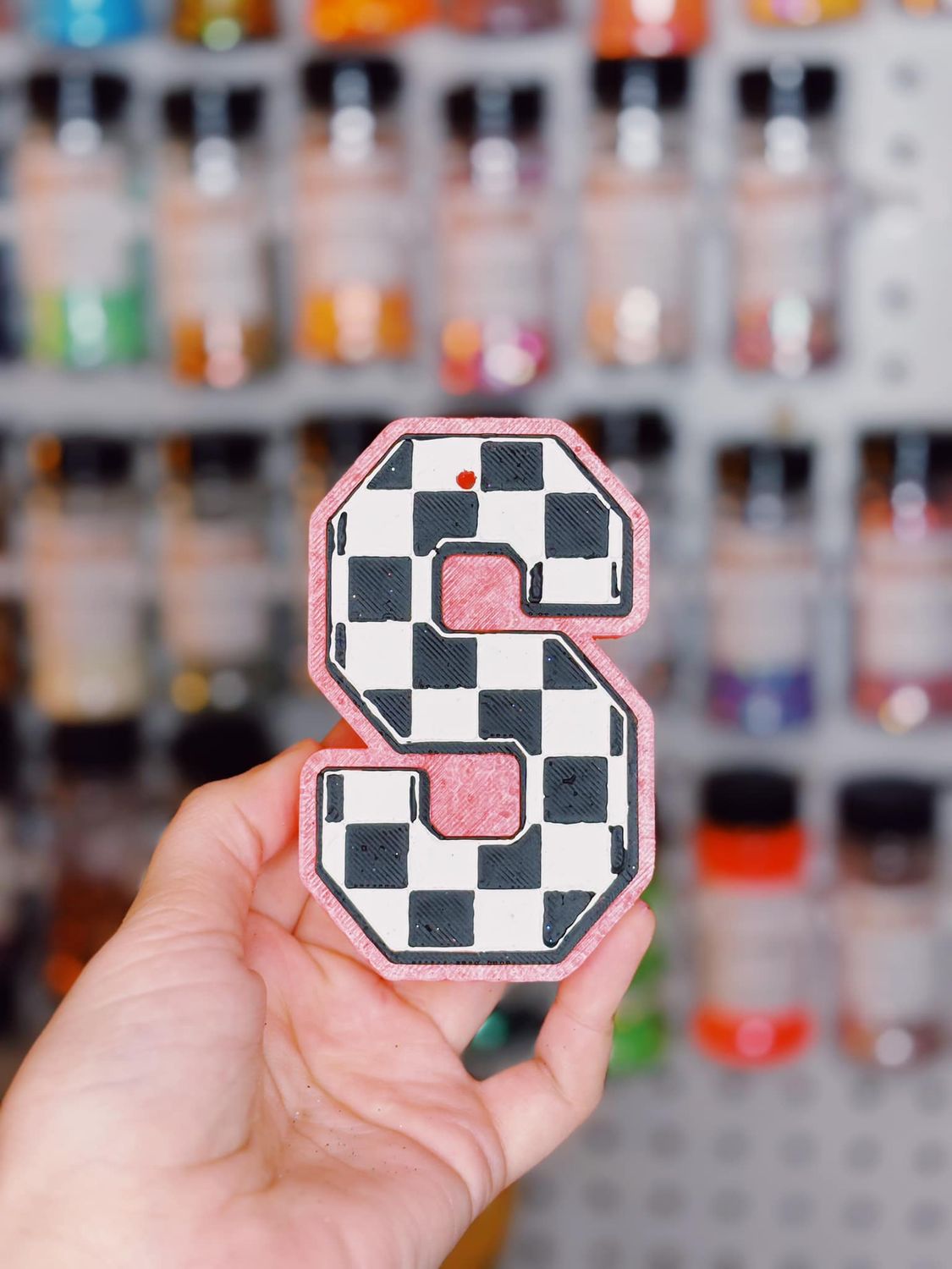 Checkered Initial Letter