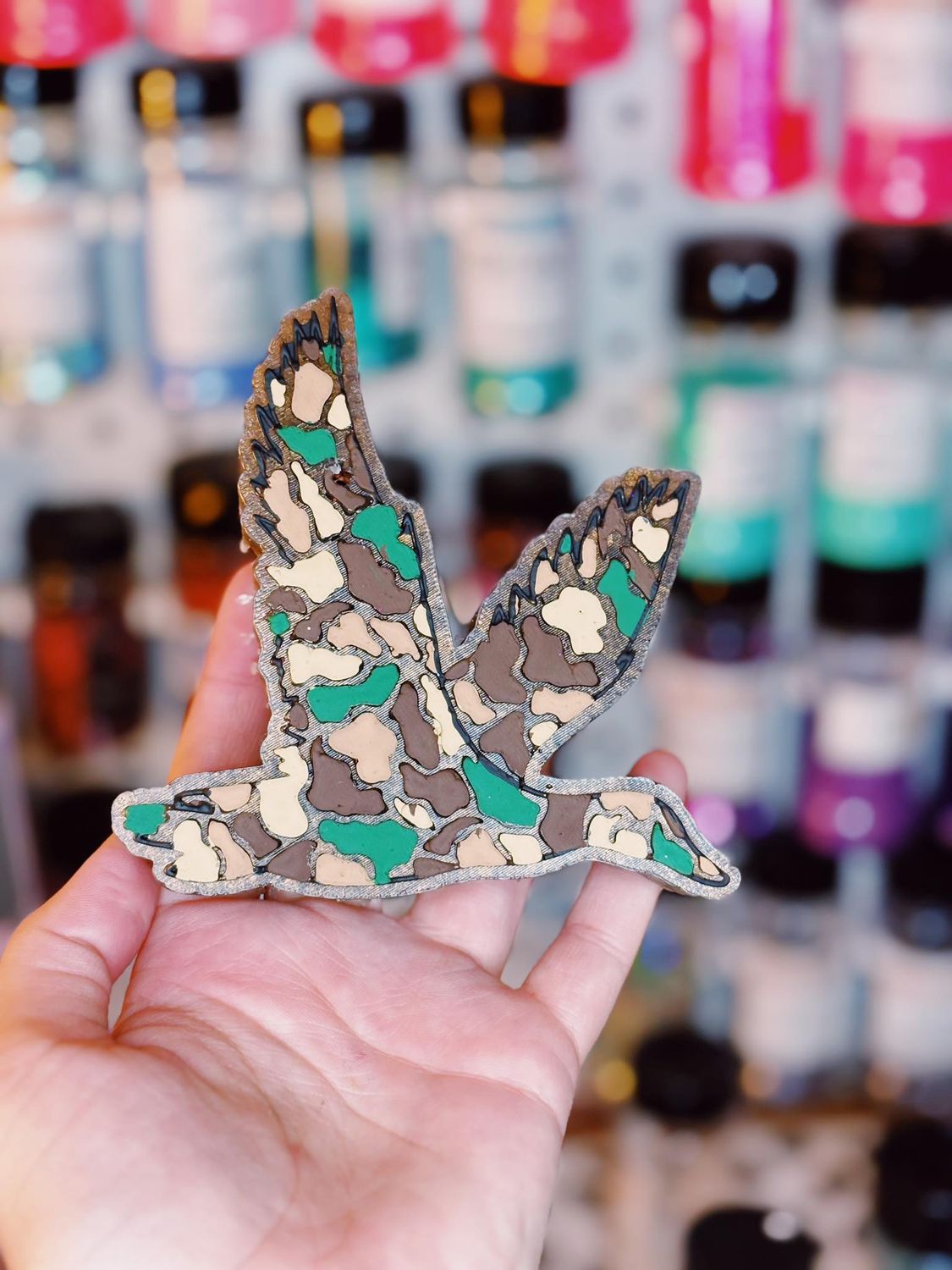 Camo flying duck
