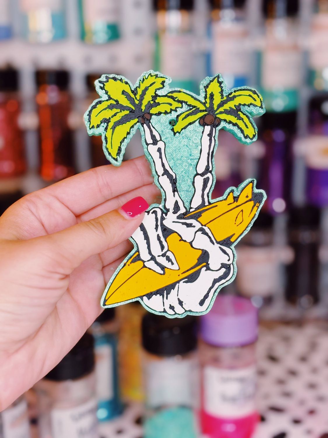 Skeleton peace with surfboard