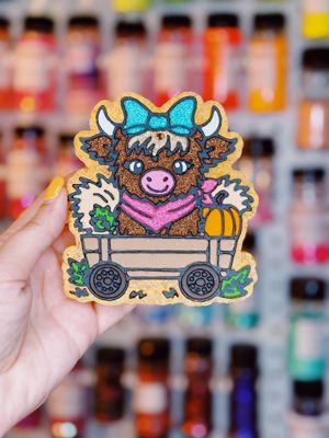 Highland in fall wagon