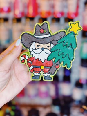 Cowboy santa with tree