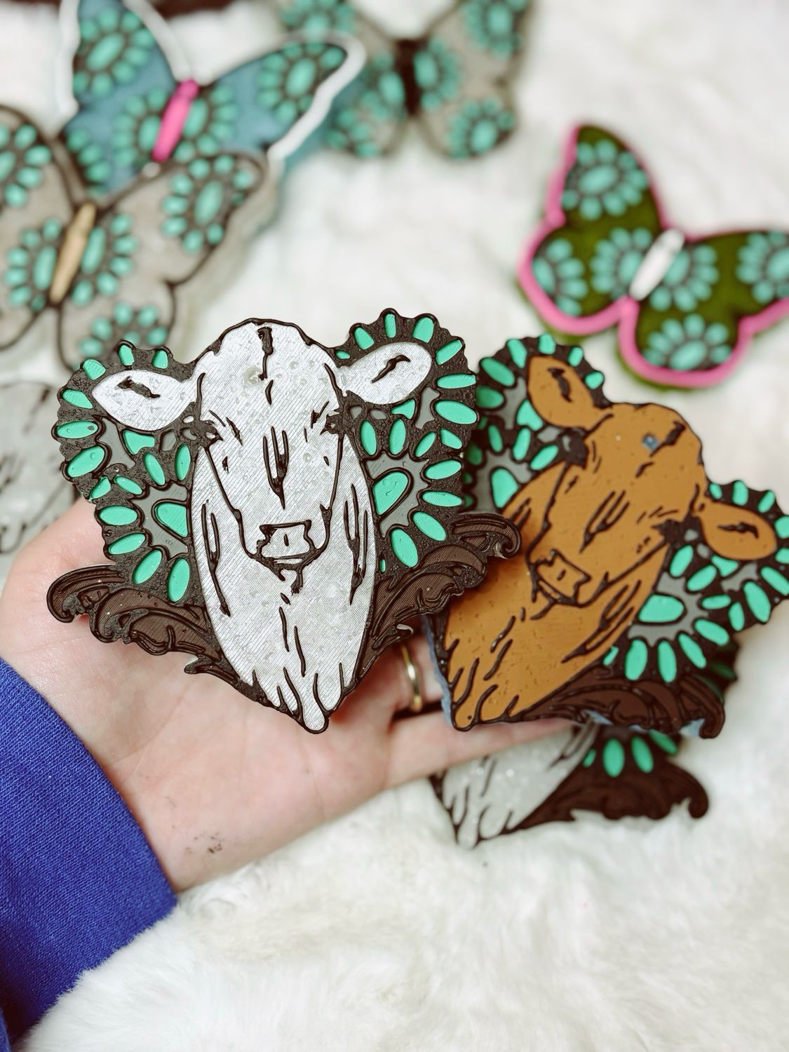 Western cow with stones