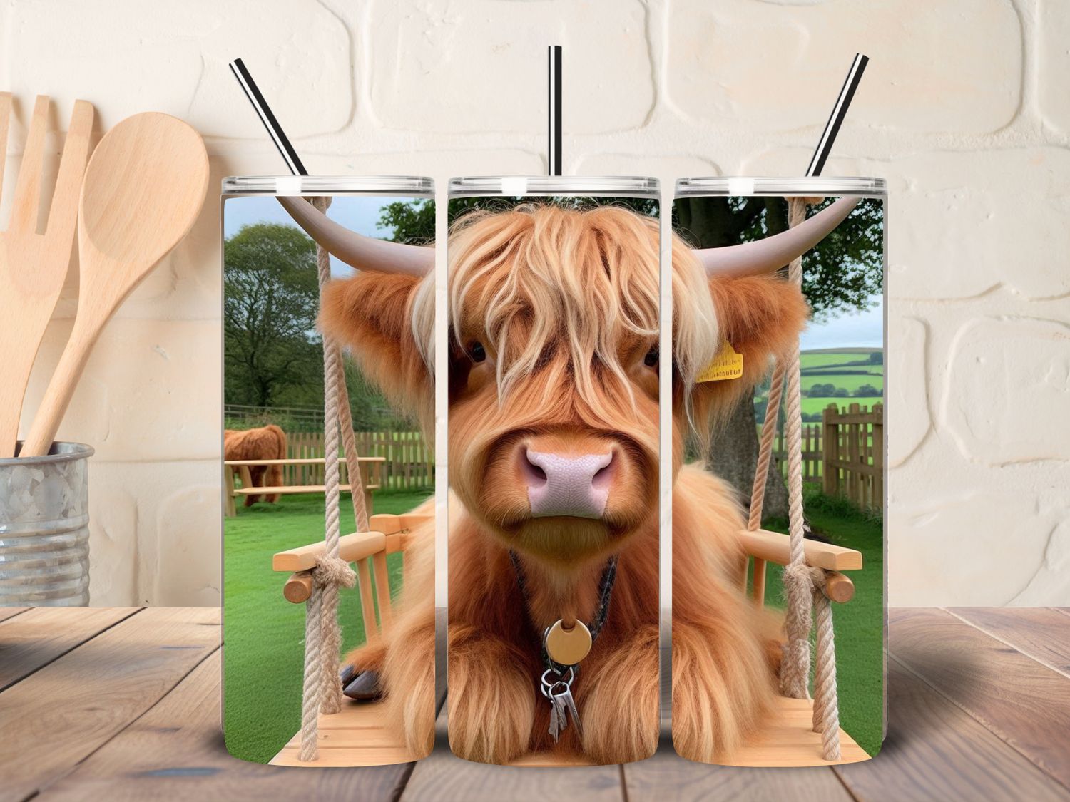 Highland cow on a swing stainless steel tumbler with lid and straw