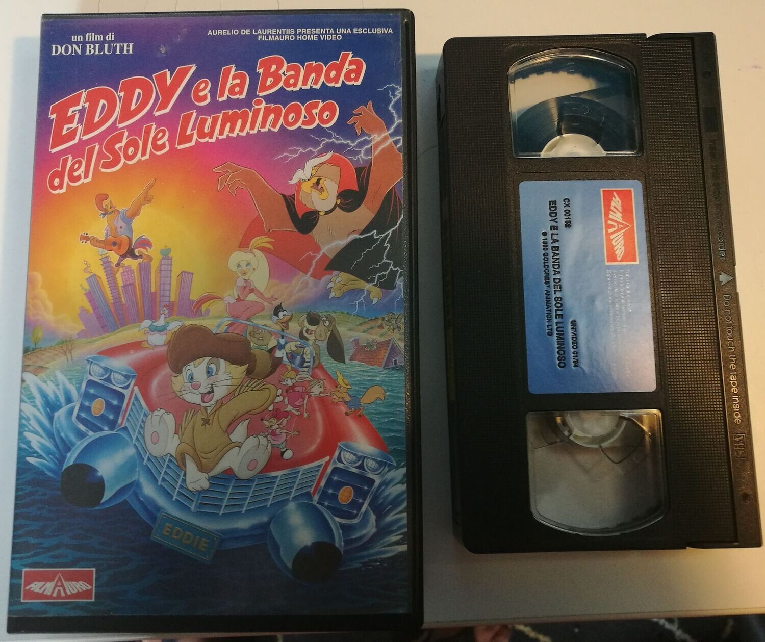 TeknoFilm - VHS – EDDY E LA BANDA DEL SOLE LUMINOSO di Don Bluth (1990) - FILMAURO