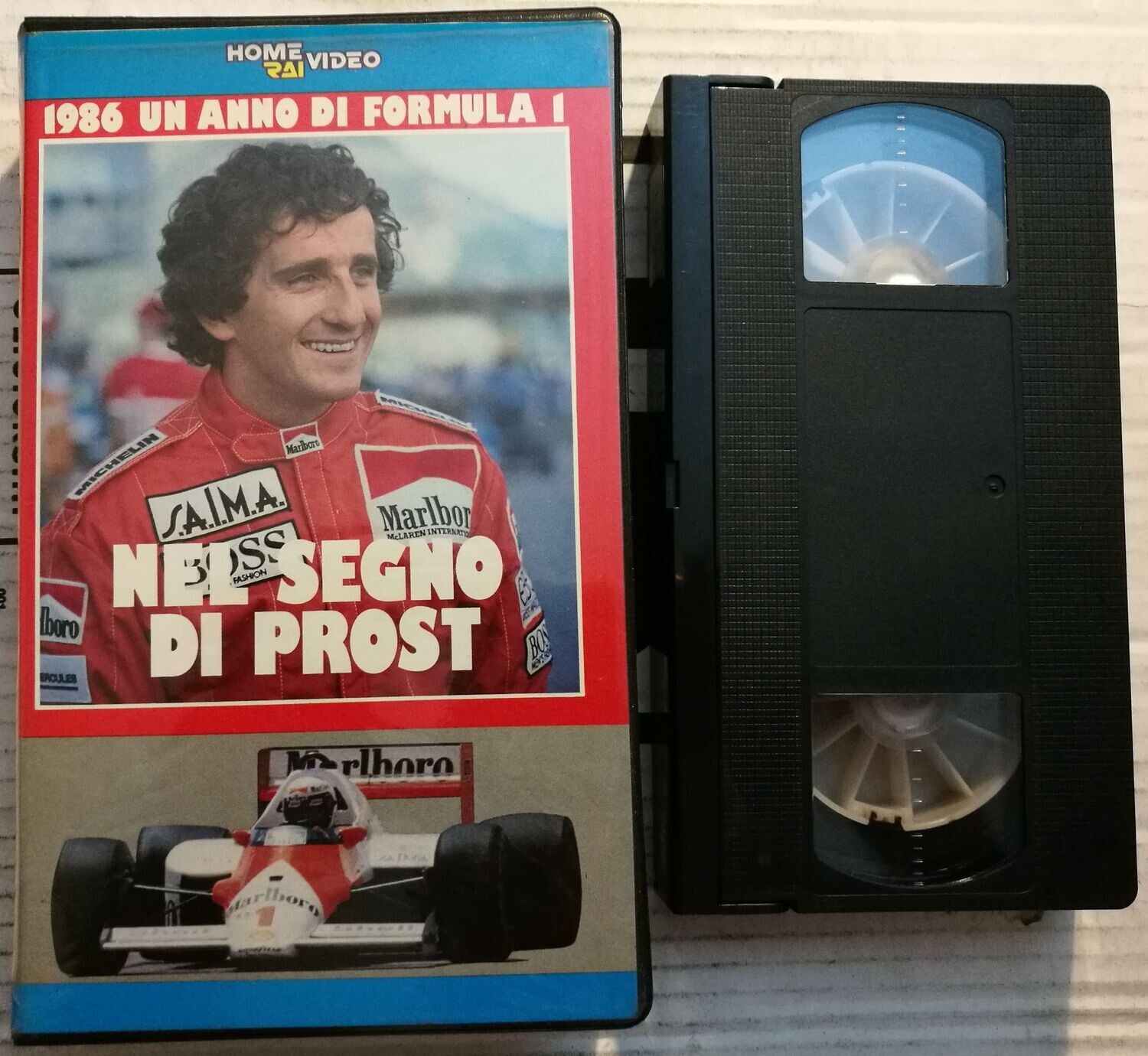 TeknoFilm - VHS – NEL SEGNO DI PROST - 1986 UN ANNO DI FORMULA 1 di A.A.V.V. (1983) - VIDEORAI (INEDITO IN DVD)