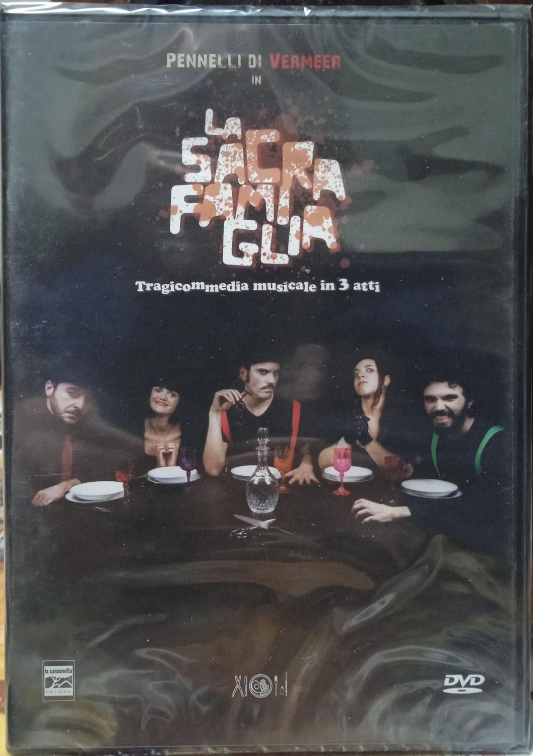TeknoFilm - DVD - Pennelli di Vermeer in: LA SACRA FAMIGLIA (Tragi-commedia in 3 atti) di Steven Forbus​ (2010) - SINTESI 3000