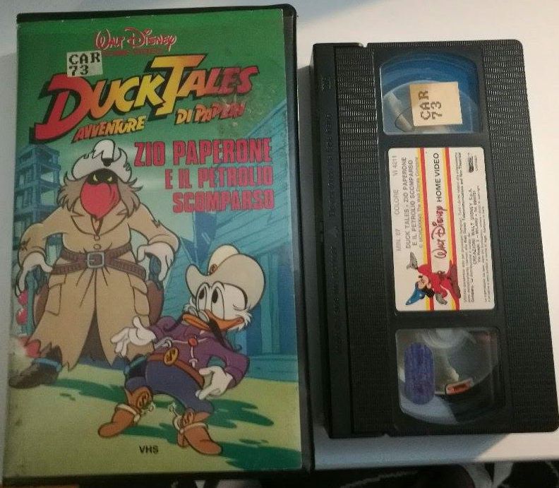 TeknoFilm - VHS – DUCK TALES AVVENTURE DI PAPERI: ZIO PAPERONE E IL PETROLIO SCOMPARSO di A.A.V.V. (1987) - WALT DISNEY (INEDITO IN DVD) TeknoFilm - VHS – DUCK TALES AVVENTURE DI PAPERI: ZIO PAPERONE E IL PETROLIO SCOMPARSO di A.A.V.V. (1987) - WALT DISNEY (INEDITO IN DVD)