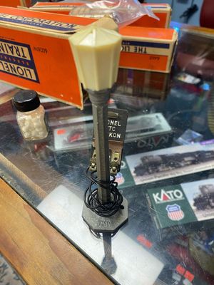 Used O Lionel Street Lamp w/track power connector.