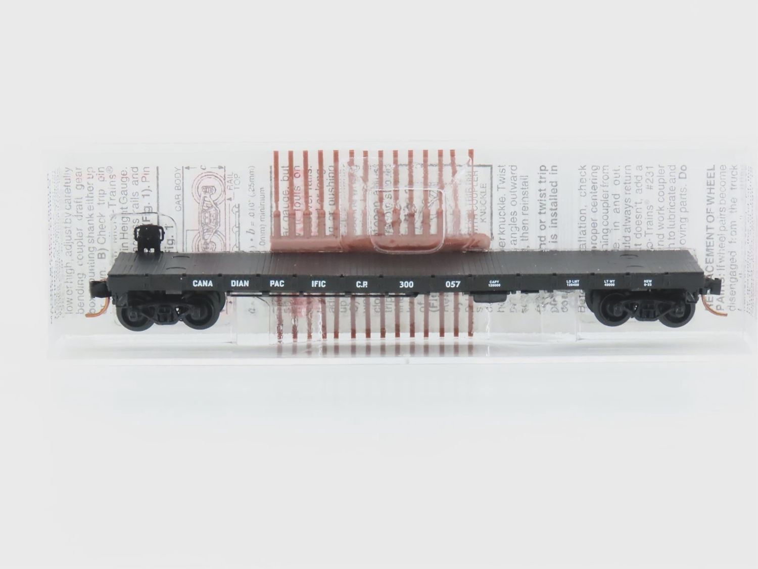 Used N Micro-Trains CP 300057 48&#39; Flatcar with Stakes