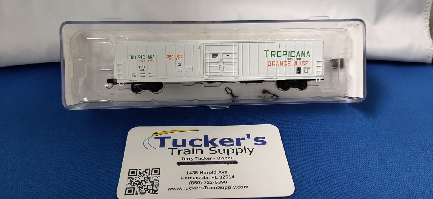 Used N Red Caboose "Tropicana Orange Juice" Freight Car TRIX228