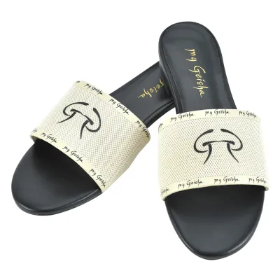 my Geisha D&#39;Azure Slides

D’Azure Slides are a versatile piece of clothing that you can easily fit into your summer wardrobe. Add a touch of originality to your fashion style with my Geisha accessories that take you out of the closet.

In order to innovate and expand the range of my Geisha products, we have launched the second extension of the fashion collection – D’Azure Slides &amp; Bag Accessories, a collection that marks the continuous development of the brand in the fashion area.

Designed in a tone of light beige, the shoes from the D’Azure collection are the result of a unique fusion between classical elements, but at the same time modern, and artistic details, with the monogram my Geisha, printed on the top.

D’Azure Slides can be integrated into all summer outfits, they are easy to wear and put on, completing a relaxed, comfortable and elegant look.

Color: Beige with my Geisha signature printed on the top
Composition: white canvas
Model: Classic
Sizes: 35 - 41
Protective bag: included

For more information, see the size guide.
If you prefer a wider fit, we recommend that you purchase a larger number than you usually wear.