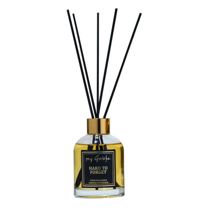 my Geisha Hard To Forget reed diffuser with black reeds and gold cap, luxury oriental woody home fragrance