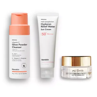 Luxury beauty ritual combining cleansing, hydration, SPF protection, and soft rosy colour.