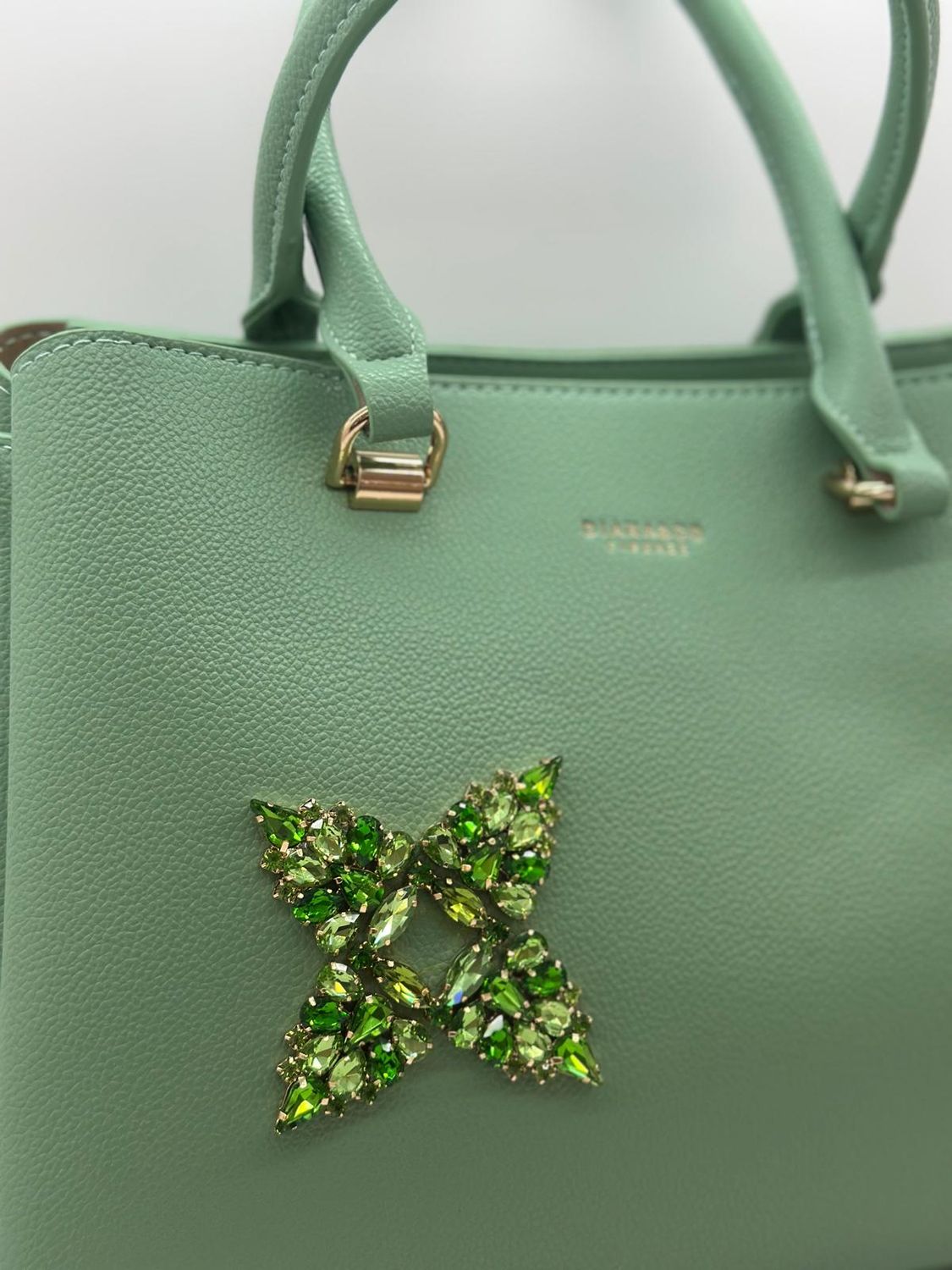 Borsa verde da cerimonia