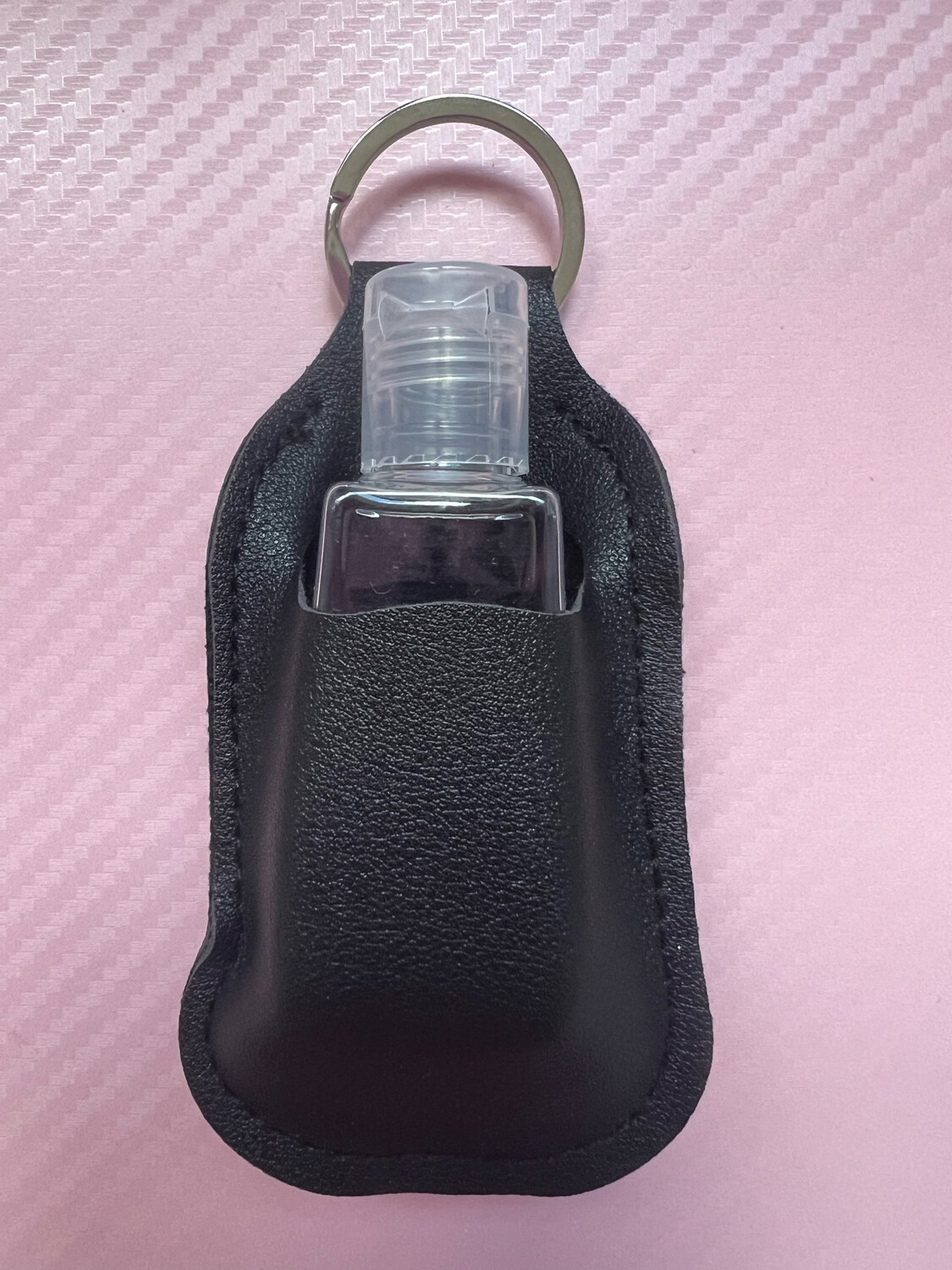 Porte clé avec bouteille pour gel anti bactérien