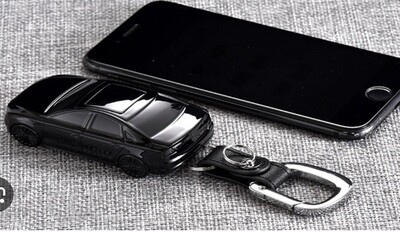 ​Introducing the Sleek and Stylish Black Car Key Fob Case Suit Cover: Elevate Your Key Experience!