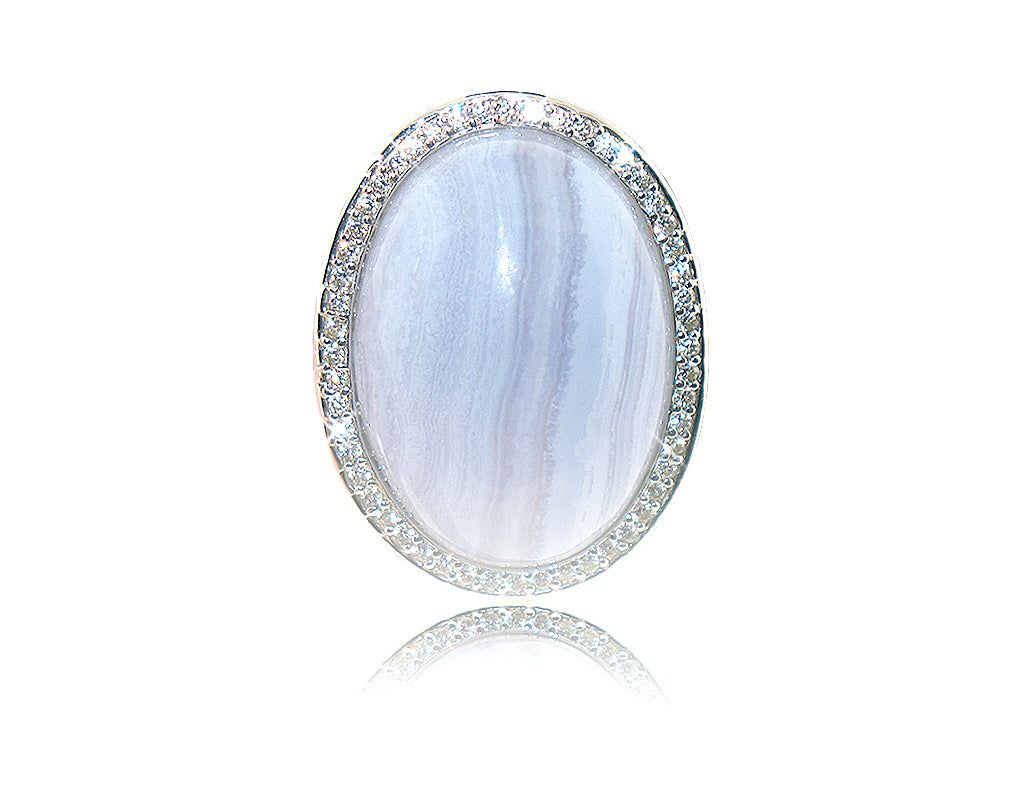 Dazzlers Sterling Silver Rhodium Plated and Simulated Blue Lace Agate center stone with CZ Halo Rin…