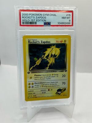 15/132 Rocket's Zapdos 1st Edition PSA 8
