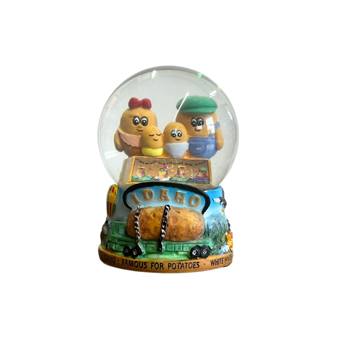Spud Family Snow Globe Spud Family Snow Globe