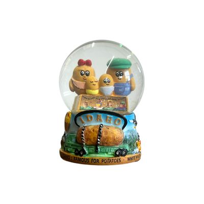 Spud Family Snow Globe