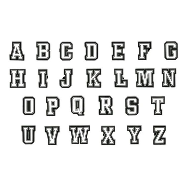 Pins lettres blanches