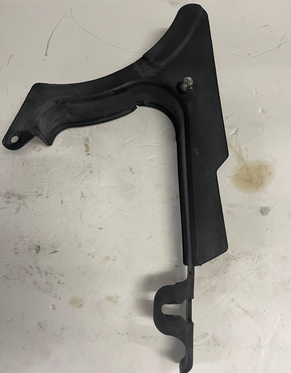 Lower Chain Guard 60362-00-Pulled from a 2005 Harley-Davidson FXSTI Softail Standard
