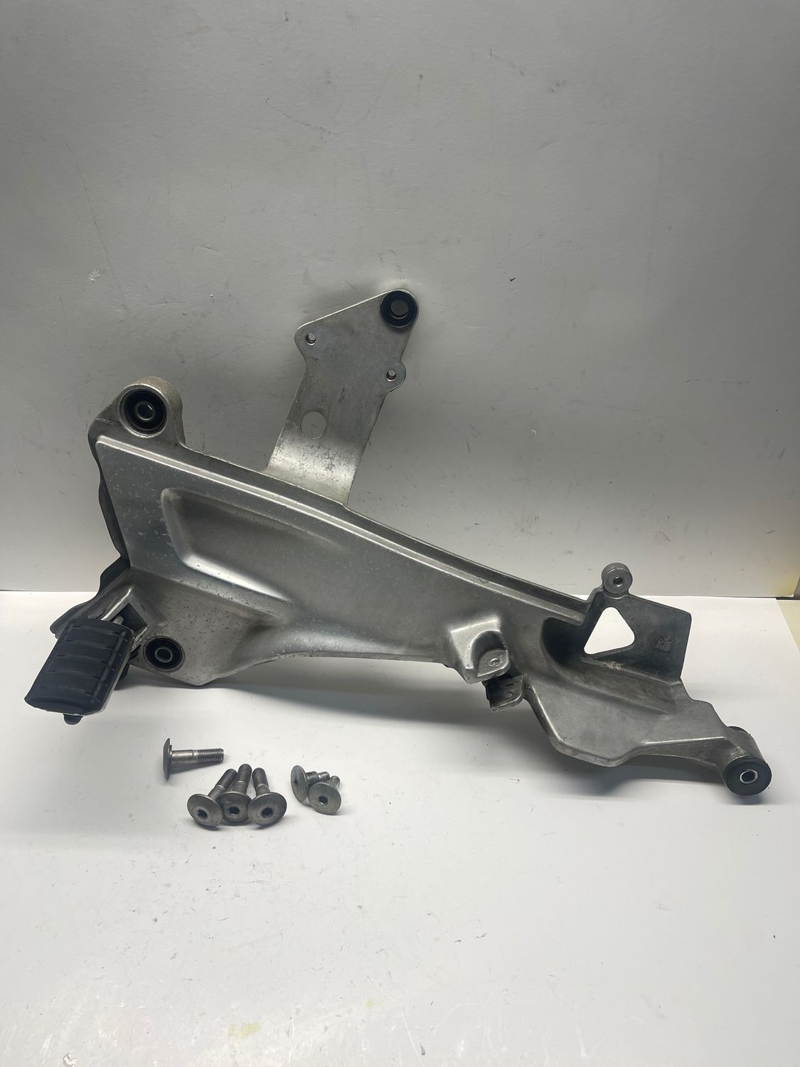 Left Front Foot Rest Step Holder 50700-5AJ-G21--2003 Honda ST1100 Police Left Front Foot Rest Step Holder 50700-5AJ-G21--2003 Honda ST1100 Police