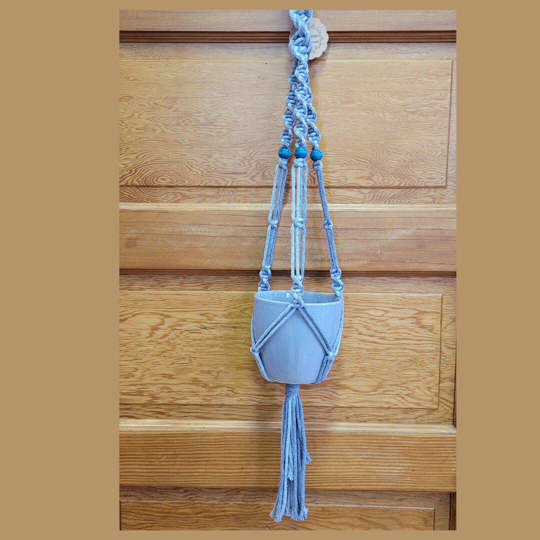 Grey macrame plant holder