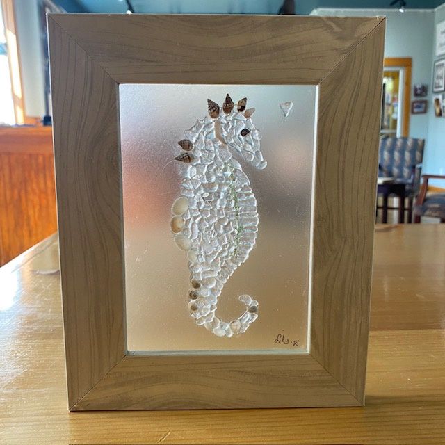 White seahorse with heart